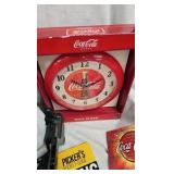 Coke Clock, Goblet, Tin, and Books Coke Clock, Goblet, Tin, and Books