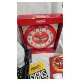 Coke Clock, Goblet, Tin, and Books Coke Clock, Goblet, Tin, and Books