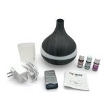 Like New Essential Oils Diffuser with Three Essential Oils (Over Half Full)