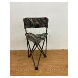 Mobile hunting blind trifold chair.