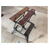 Adjustable folding work bench