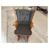 Wooden rocking chair with cushions