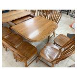 Large dining room table with 4 inserts and 14 chairs