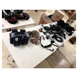 Recharchable battery pack stand w/5 batteries and random cords/tech