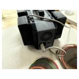 Recharchable battery pack stand w/5 batteries and random cords/tech