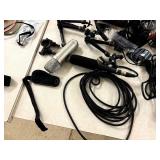 Recharchable battery pack stand w/5 batteries and random cords/tech