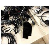 Recharchable battery pack stand w/5 batteries and random cords/tech