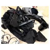 Recharchable battery pack stand w/5 batteries and random cords/tech