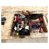 Assortment of garage items including spent shells belt