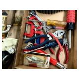 Assortment of garage items including spent shells belt