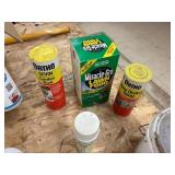 Assortment of spray bottles and chemicals