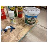 Assortment of spray bottles and chemicals