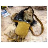 Assorted contents with flask and skin carrier