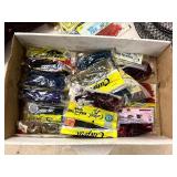 Assortment of fishing plastics and accessories