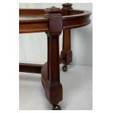 Gabberts Wooden Coffee Table on Wheels with Oval Glass Top Gabberts Wooden Coffee Table on Wheels with Oval Glass Top