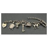 Sterling Silver .925 Rings, Charm Bracelets and 3 Charms Sterling Silver .925 Rings, Charm Bracelets and 3 Charms