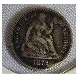 1872 Seated Liberty Half Dime Type 4, featuring a legend on the obverse side. 1872 Seated Liberty Half Dime Type 4, featuring a legend on the obverse side.