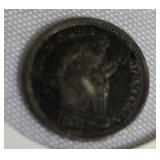 1873 Seated Liberty Half Dime Type 4, featuring a legend on the obverse side. 1873 Seated Liberty Half Dime Type 4, featuring a legend on the obverse side.