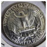 Two Washington quarters from 1964. Two Washington quarters from 1964.