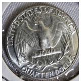 Two Washington quarters from 1964. Two Washington quarters from 1964.