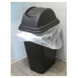 4 garbage cans and a wet floor sign 4 garbage cans and a wet floor sign