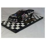 Dale Earnhardt Sr. Goodwrench Monte Carlo – Black Diecast "Bricks" Brickyard Win Replica on Checkered Base