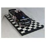 Dale Earnhardt Sr. Goodwrench Monte Carlo – Black Diecast "Bricks" Brickyard Win Replica on Checkered Base