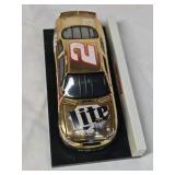 Rusty Wallace Miller Lite Ford Taurus – Gold Chrome Diecast on Black Base
