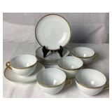 Limoges France Marshall Fields (M.F. & C.) Chicago Gold Encrusted Porcelain Dinnerware Set with Gold Trimmed Teacups and Saucers from O. & E. G. Royal Austria
