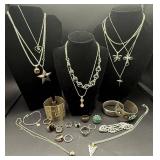 Bundle of Silver Toned Jewelry - Necklaces, Bracelets and Rings
