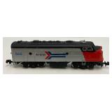 Group Of N Scale Engines Including AMTRAK With Pennsylvania Train Cars And More