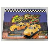 New Old Stock Case Of City Yellow Cab Die Metal And Plastic Cast Taxis With Pull Back And Go Action