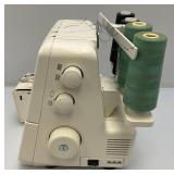 New Home Differential Feed HF504D Serger With Manual