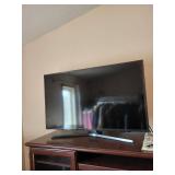 Samsung 40 in LED TV with Slim Bezel and Curved Stand