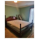 Four-Poster Bed in Dark Wood with Carved Finials