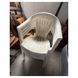Four White Stackable Plastic Outdoor Chair