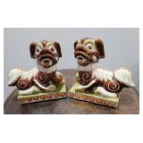 Brown and White Foo Dog Statues