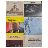 Jazz Vinyl Record Collection Featuring Miles Davis and John Coltrane