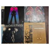 Jazz Vinyl Record Collection Featuring Miles Davis and John Coltrane