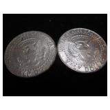 Nine Kennedy Half Dollars