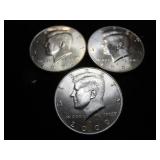 Nine Kennedy Half Dollars