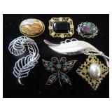 Seven Brooches / Pins