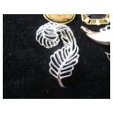 Seven Brooches / Pins