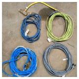 Lot of (4) extension cords and (3) two-way splitters
