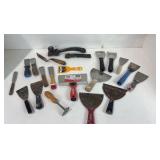 Lot of scrapers and spackling tools