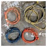 Lot of (4) extension cords.