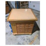 Rolling work table with built-in shelving