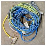 Lot of (4) extension cords and (3) two-way splitters