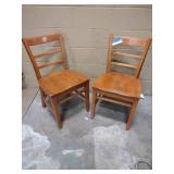 2 wooden straight chairs