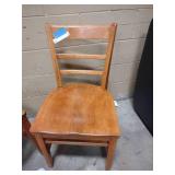 2 wooden straight chairs